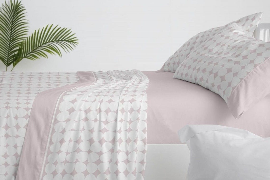 Bajera ajustable Burrito Blanco rosa colorete para colchones hasta 32 cm, con textura suave.