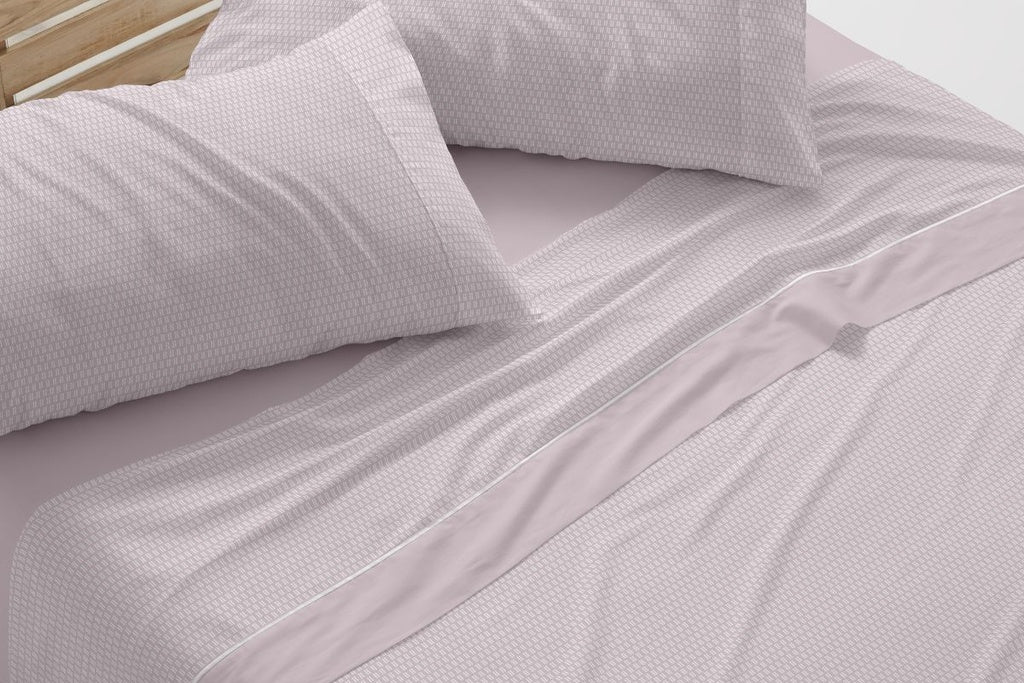 Funda de almohada o esquina de cama con sábanas Burrito Blanco Dorvel nude, demostrando ajuste y diseño.