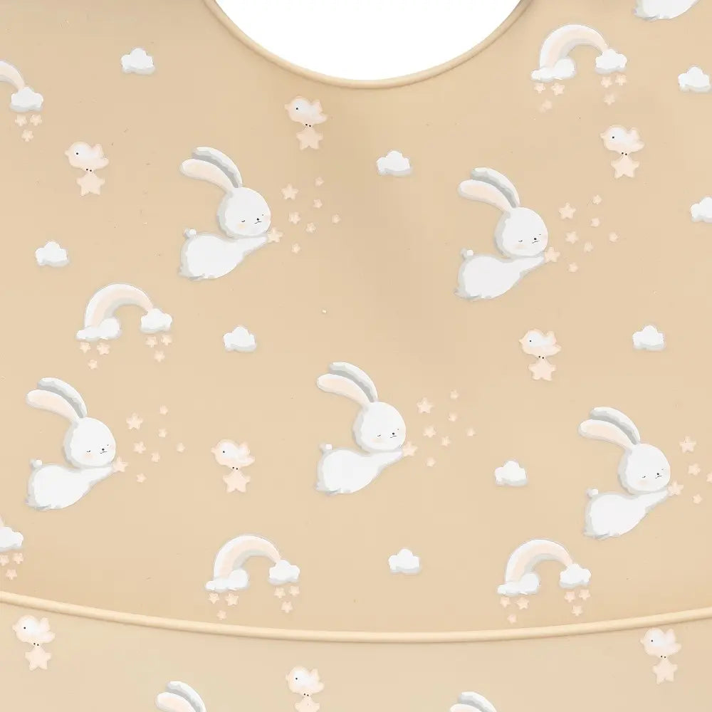 BABERO SILICONA ESTAMPADO CONEJITOS BEIGE INTERBABY