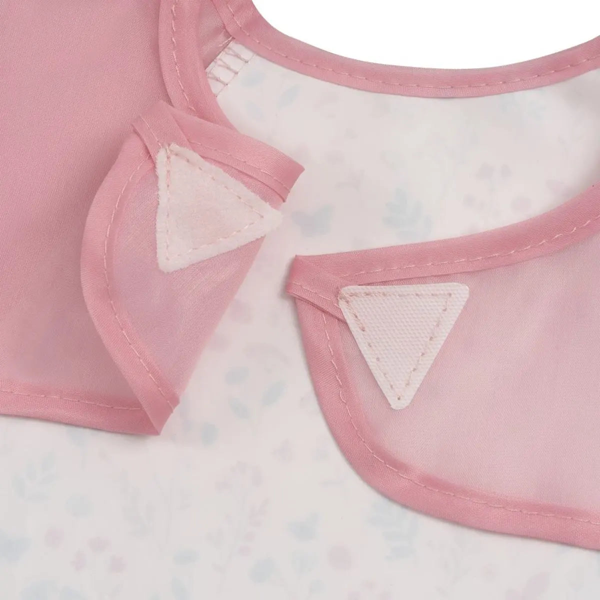 BABERO CON MANGAS ESTAMPADO FLORES PETALOS ROSA INTERBABY