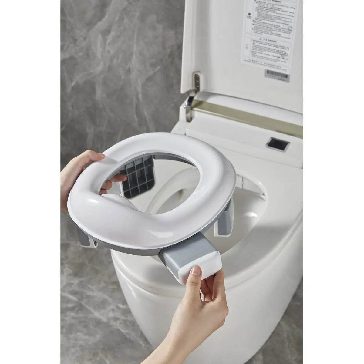 BABY WC REDUCTOR BCO/GRIS INTERBABY